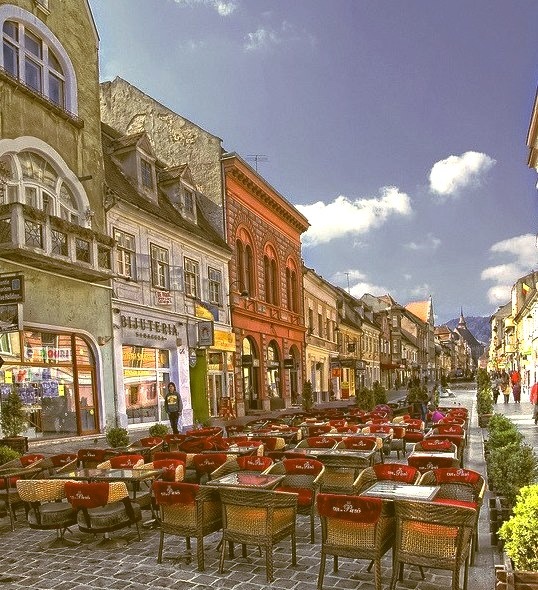 by 23gxg on Flickr.Pedestrian street view in the transylvanian city of Brasov, Romania.