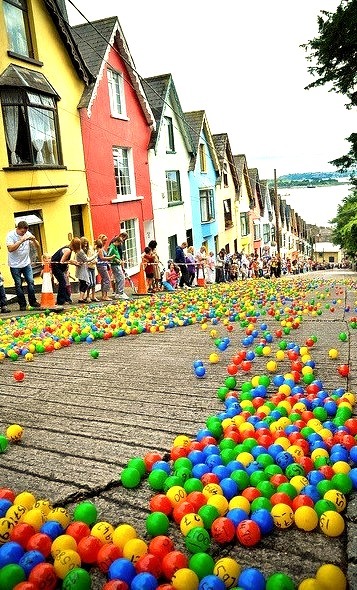 The Barrack Hill Ball Roll is a unique lottery when thousands of coloured numbered balls cascade and bounce down West View in Cobh, Ireland